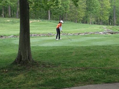 Priscilla Teeing Off at the 16th Hole